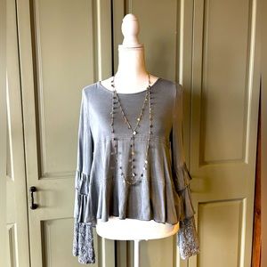 Gray long sleeved jersey top by POL size small